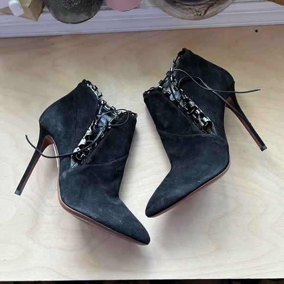 Alaia black lace up booties